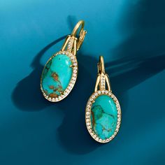 Ross-Simons - Turquoise, .30ct t. w. White Topaz Earrings in 18kt Gold Over. Elevate your earthy style with these eye-catching earrings! Ultra-bright and colorful 15x9mm oval stabilized turquoise cabochons are bordered by .30 ct. t. w. white topaz rounds set in polished 18kt yellow gold over sterling silver. Leverback, white topaz and turquoise earrings. Luxury Turquoise Drop Earrings, Luxury Turquoise Dangle Earrings, Luxury Turquoise Gemstone Earrings, Fine Jewelry Turquoise Earrings, Turquoise Fine Jewelry Earrings For Pierced Ears, Turquoise Oval Earrings For Anniversary, Oval Turquoise Earrings For Anniversary, Elegant Hallmarked Turquoise Jewelry, Turquoise Fine Jewelry Earrings