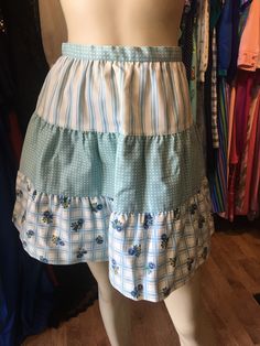 "Vintage petite Bobbie Brooks tiered spring skirt. Excellent condition. Measurements: 24\" waist 48\" hip 18\" length" Spring Skirted Layered Bottoms, Layered Skirted Bottoms For Spring, Flowy Tiered Ruffle Skort, Spring Fitted Tiered Mini Skirt, Tiered Blue Skirt With Ruffles, Fitted Tiered Mini Skirt For Spring, Blue Tiered Skirt For Spring, Vintage Fitted Mini Skirt With Tiered Design, Vintage Fitted Tiered Mini Skirt