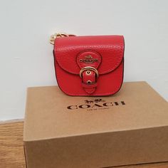 Coach Mini Buckle Saddle Bag Charm/Key Chain. New With Tag. Leather. 100% Authentic. Shop My Closet With Confidence. 3 1/4(L) 2 3/4(H) 1 1/4(W) Trendy Red Coach Bag, Gift Red Shoulder Bag With Gold-tone Hardware, Coach Satchel Shoulder Bag Gift, Chic Coach Shoulder Bag Gift, Trendy Red Coach Shoulder Bag, Chic Coach Shoulder Bag As Gift, Chic Coach Shoulder Bag For Gift, Compact Red Bag For Daily Use, Compact Red Travel Bag