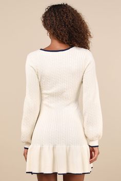 Winter dates are always cuter in the Lulus Coziest Poise Ivory Cable Knit Long Sleeve Sweater Mini Dress! Soft and stretchy cable knit shapes this chic dress that has long balloon sleeves and a scoop neckline. Bodice has a flattering silhouette and falls to a fitted waist, atop a bodycon skirt that ends at a ruffled, ribbed mini hem. Navy blue trim accents the neckline, ribbed cuffs, and hem. Fit: This garment fits true to size. Length: Mid-thigh. Size medium measures 33.5" from shoulder to hem. Winter Dates, Knitted Sweater Dress, Cable Knit Dress, Sweater Mini Dress, Christmas Dresses, Tier Dress, Tiered Ruffle Dress, Long Sleeve Knit Dress, Bodycon Skirt