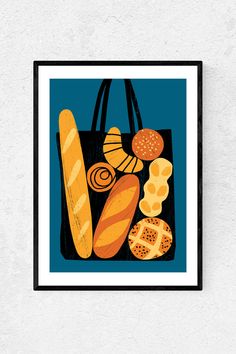 a bag full of breads and pastries on a white wall with a black frame