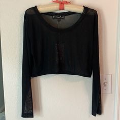 Long Sleeve Sheer Top With Elastic Bottom. Tags On, Never Worn. Fits More Like Medium/Large. I’m Size 14 And It Was Too Tight. Probably More Like 10/12 Black Mesh Sleeves Crop Top For Spring, Black Stretch Crop Top With Mesh Sleeves, Black Cropped Mesh Top With Mesh Sleeves, Black Sheer Stretch Crop Top, Black Sheer Crop Top For Spring, Spring Sheer Black Crop Top, Black Stretch Crop Top For Layering, Edgy Stretch Mesh Top For Spring, Edgy Black Mesh Top With Sheer Sleeves