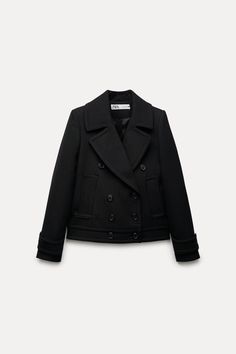 Get ready to turn heads with this stunning Zara double-breasted wool short coat/jacket in black, size M. The classic fit and solid pattern make it perfect for any occasion, from travel to business meetings. The jacket features a button closure and long sleeves, making it suitable for fall, winter, and spring seasons. Made from a high-quality blend of 64% polyester, 35% wool, and 1% elastane, the outer shell material gives the jacket a luxurious look and feel. The coat also comes with a 100% viscose lining material to keep you warm and comfortable. This stylish pea coat has all the qualities of a wardrobe staple and is a must-have for any fashion-savvy woman.