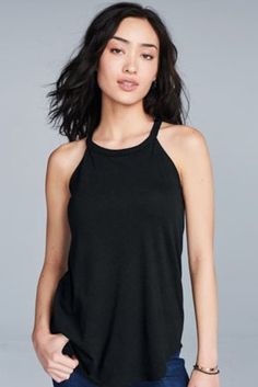 This Rocker tank is crafted with a high neckline and a super soft, Tri-Blend fabric composed of 50% polyester, 25% combed ring-spun cotton and 25% rayon. Great for DIY projects or to wear blank. Super soft Tri-Blend Rocker tanks! -High Neck Line -4.5-ounce, 50/25/25 poly/combed ring-spun cotton/rayon Stretch T-back Tops For Workout, Stretch High Neck Yoga Tops, Stretch High Neck Tops For Yoga, High Neck Stretch Tops For Yoga, High Neck Stretch Yoga Tops, Sporty Stretch Halter Neck Top, Stretch Halter Neck Tank Top For Workout, Sporty High Neck Tops For Gym, Sporty High Neck Gym Tops