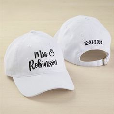 * Personalize with any last name  * Back side will include any date  * Choose from multiple font and thread color options * Thread color shown in black  * Perfect for any sport or activity * Adjustable closure * Fits hat sizes 6 5/8 - 7 3/8 * 100% cotton twill white hat * Hand wash only * Imported Our Bride Bling Embroidered Baseball Caps are the perfect gifts for her engagement, bachelorette trip, bridal shower or a just because gift. White Baseball Hat, Black Baseball Hat, Personalization Mall, Personalized Throw Pillow, Teacher Personalized, Bachelorette Trip, Embroidered Baseball, Bride Accessories, White Caps