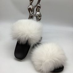 Jj Walk Couture Embodies A Chic, Fashionable Woman With A Busy And Trendy Lifestyle. Jj Walk Couture Slides Are Chic, Comfortable And Always On Trend. Our Slides /Slippers Has A Slight Curve To Conform To The Natural Curvature Of The Feet To Give You Good Balance And Comfort While Walking. 100% Authentic Fox Fur And Handmade. If You Wear A Half Size, We Suggest You Order A Size Up. Comfortable White Flat Heel Slippers, White Slip-on Synthetic Slippers, White Slip-on Flat Slippers, White Synthetic Winter Slippers, White Flat Slippers For Winter, White Round Toe Slippers For Spring, Trendy White Synthetic Slippers, White Flat Winter Slippers, Trendy Lifestyle