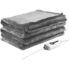 three blankets are stacked on top of each other with a cord attached to the blanket