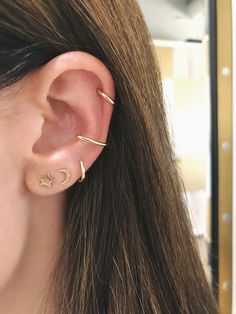 Our simple and classic Gold Mini Huggie Earrings never go out of style. We love the versatility these huggies bring to the table. Need to change your outfit but don't have time to switch up the accessories? We've got you covered. These staple huggies are always in fashion and feature your choice of 14k yellow, rose, or white gold. Diameter of mini huggie: 9.5mm Inner huggie diameter: 6mm