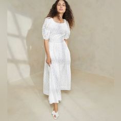 Lantern Puff Sleeve Dress In White Cotton With Lattice Embroidery. Berthe Flares Out From The Hips And Features A Zipper Closure On The Back As Well As Full Lining. White Dress With Puff Sleeves And Voluminous Skirt, Elegant Puff Sleeve Dress With Broderie Anglaise, Puff Sleeve Broderie Anglaise Dress For Daywear, Puff Sleeve Dress Casual, White Puff Sleeve Dress, Billowy Sleeves, Casual Luxe, Dresses Royal, Puff Sleeve Dress