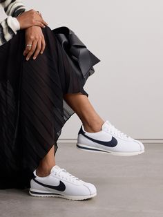 Nike won a debut gold with its 'Cortez' sneakers at the 1972 Olympics, so it's fitting the brand releases a fresh version in time for this year's games. Made from leather in a blue and white colorway, they feature the signature 'Swoosh' and logo heel tab accented with gold lettering. The mesh lining ensures breathablity. Nike Classic Cortez Outfit, Nike Cortez Outfit, 1972 Olympics, Workout Sneakers, Nike Classic Cortez, Classic Cortez, Sneaker Lovers, High Fashion Outfits, Nike Classic