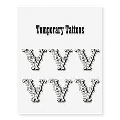 temporary tattoos with the letters w and w in black ink on white paper, set of four