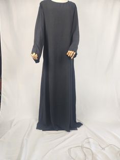 Perfect Inner dress for any of your open Abayas. Pair it with any of our open Abayas in store or you can wear it under any of your existing abaya for extra protection or by it Self.Super comfortable and stretchy material with added pockets.  It come in 2 colors Black and White Abaya Inner Dress, Fitted Long Sleeve Black Abaya, Solid Long Thobe For Eid, Long Thobe For Eid, Long Solid Niqab For Eid, Solid Long Niqab For Eid, Long Niqab For Eid, Fitted Solid Maxi Length Abaya, Solid Long Sleeve Maxi Dress For Eid