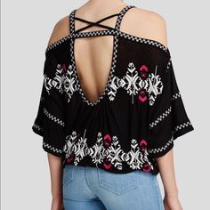 Gorgeous Top! Pretty Embroidery With Open Back Detail. Has Elastic At The Bottom. Hard To Measure Due To Style But Sizing Can Be Flexible Due To The Fit. Embroidered Black Beach Blouse, Beach V-neck Tops With Geometric Embroidery, Embroidered Black Blouse For Beach, Black Embroidered V-neck Top, Black Embroidered V-neck Top For Summer, V-neck Tops With Geometric Embroidery For Vacation, Black V-neck Embroidered Top For Summer, Spring Black Top With Geometric Embroidery, Black V-neck Top With Floral Embroidery