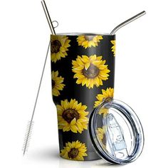 the sunflower tumbler has a straw in it and is black with yellow flowers