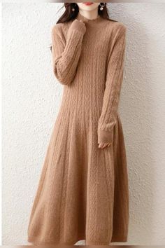 Elegant and sophisticated, the Long Wool Dress is a timeless wardrobe staple. Crafted from high-quality wool, it offers both warmth and style. Its minimalist design makes it versatile for various occasions, from formal events to casual outings. Embrace classic elegance with the Long Wool Dress, a must-have piece for your collection. Classic Long Sleeve Midi Dress, Elegant Solid Color Midi Dress For Fall, Winter A-line Midi Dress For Office, Elegant Solid Midi Dress For Fall, Elegant Beige Midi Dress For Winter, Formal Wool Dress For Winter, Formal Winter Wool Dress, Classic A-line Winter Dress, Classic Midi Dress For Formal Fall Occasions