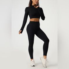 Features: Basic Style Number Of Pieces: Two-Piece Stretch: Slightly Stretchy Material Composition: 90% Nylon, 10% Spandex Care Instructions: Machine Wash Cold. Tumble Dry Low. Imported Product Measurements: S:Top Length 13.39 In, Bust 28.35 In, Waist 23.62 In, Hip 28.35 In, Bottom Length 31.50 In M:Top Length 13.78 In, Bust 29.92 In, Waist 25.20 In, Hip 29.92 In, Bottom Length 32.28 In L:Top Length 14.17 In, Bust 31.50 In, Waist 26.77 In, Hip 31.50 In, Bottom Length 33.07 In **Expect 5-10 Busine Stretch Elastane Yoga Pants Sportswear, Stretch Sportswear Yoga Pants, Stretch Elastane Yoga Pants, Solid Stretch Elastane Activewear, Solid Workout Tights, Long Sleeve Elastane Activewear For Gym, Solid Activewear With Thumbholes In Elastane, Stretch Elastane Activewear With Thumbholes, Versatile Fitted Elastane Yoga Pants