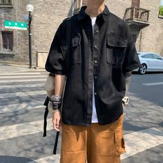 Wiaofellas - Summer Half leeve Cargo Men Shirts Japanese Ins Casual Blouse Trendy Y2K Chic Loose Shirts Biker Motor Big Size Loose Streetwear ◆M Length:70cm Bust:60cm Sleeve:18cm Shoulder:60cm◆L Length:72cm Bust:62cm Sleeve:19cm Shoulder:62cm◆XL Length:72cm Bust:64cm Sleeve:20cm Shoulder:64cm◆XXL Length:76cm Bust:66cm Sleeve:21cm Shoulder:66cm ◆Size Issue: All measurement in cm and please note 1cm=0.39inch,1 inch=2.54cm, due to the manual measurement, please allow 1-3cm difference. ◆The Size is Urban Black Button-up Top, Black Tops With Pockets And Casual Collar, Casual Ulzzang, Male Clothing, Summer Soft, Cargo Shirts, Safari Style, Loose Shirts, Green Shirt