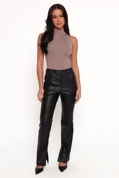 DETAILS   What sets these pants apart is the hem split feature and straight leg style, which add a modern twist to a classic silhouette. Whether you're dressing them up for a night out or keeping it casual for a day in the city, these faux leather pants are your go-to for an effortlessly stylish ensemble.   faux leather  high waisted  side invisible zip  elastic waistband  hem split feature  straight leg style  unlined   material - 60% PU / 40% cotton    SIZING    studio model is 5' 6" and wears Satin Dresses Long, Satin Dresses Long Sleeve, Black Tie Wedding Guests, White Dress Shoes, Leather Pant, Resort Dresses, Crop Top Tees, Bridesmaid Outfit, Invisible Zip