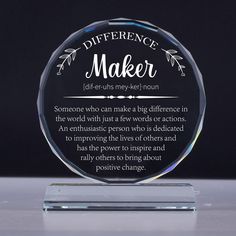 a clear glass award with the words maker on it