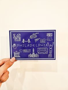 Details: This postcard features an illustration with lots of Philadelphia icons! The back of the postcard reads "hello" at the top and includes a place to write addresses and a personal note. Find more Pennsylvania and Philadelphia postcards and stickers in the shop! Printed on high-quality paper in the USA.  Size: 4 x 6 inches. Quantity: Available as a single postcard or in a six-pack. Shipping: All domestic U.S. orders have free shipping! Small orders are shipped via USPS postage and do NOT in Luxury Postcard, Movin On, Six Pack, Linocut, Pennsylvania, Stationery Paper, Philadelphia, 6 Inches