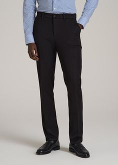 About Our Stretch Dress Pants for Tall Men Searching for slacks for tall men is challenging, and finding ones that are actually comfortable is even harder. That’s why we made these men’s tall pants with a unique stretch twill. A touch of flex gives all day comfort while the twill offers a classic finish. Equally polished and easy to wear, these pants are designed specifically for men from 6’3 to 7’1. We wanted to create an elevated basic for tall guys that can be worn to work, dinner or upscale Black Stretch Pants For Business, Business Black Slim Fit Bottoms, Black Slim Fit Bottoms For Business, Slim Fit Black Bottoms For Business, Black Stretch Dress Pants For Business, Black Tailored Tapered Leg Pants, Classic Black Slim Fit Work Pants, Classic Black Slim Fit Pants, Tailored Black Dress Pants