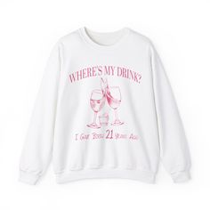 a white sweatshirt with pink lettering that says, where's my drink? and two glasses