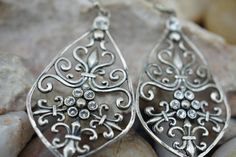 This is the perfect option for those who like cool, unique jewelry and the luxury, shine of silver. The pierced earrings have a shape of drops. The earrings have filigree design and the earrings are decorated with crystals. It is perfect for a gift for birthday, mother's day and holidays. ❤️ The earrings are about 1 2/4'' by 7/8''(in the widest place). ❤️ There is a hallmark: 925.Thailand. Everyone interested in the jewelry should remember that he or she must like their jewelry- not just at firs Silver Dangle Plug Earrings For Gifts, Elegant Silver Nickel-free Plug Earrings, Silver Plug Earrings As Gift, Handmade Silver Plug Earrings For Anniversary, Silver Nickel-free Drop Crystal Earrings, Nickel-free Silver Drop Crystal Earrings, Elegant Silver Plug Earrings As A Gift, Handmade Silver Crystal Earrings For Anniversary, Unique Silver Plug Earrings For Jewelry Making