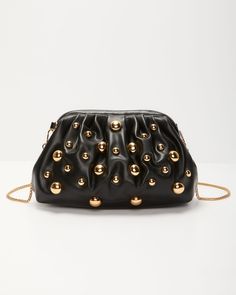 Unleash your inner star with the Make A Scene Studded Pouch Clutch. Crafted from luxe vegan leather, this clutch is your ultimate date night companion, blending edgy cool with a dash of romance. Its hinge closure reveals a chic interior with a main compartment and a secure zipper pocket, perfect for keeping essentials close. Adorned with gold-tone ball accents and a detachable chainlink shoulder strap, it’s designed to catch eyes and turn heads. FINAL SALE Material: Vegan Leather Hinge closure One main compartment with interior zipper pocket Chainlink shoulder strap Gold-tone ball accents throughout Dimensions: 9.6” L x 3.1” W x 5.7” H Edgy Crossbody Party Bag, Edgy Crossbody Bag For Party, Edgy Party Crossbody Bag, Evening Pouch Clutch With Zipper Closure, Trendy Pouch Clutch For Events, Trendy Pouch Shoulder Bag For Events, Trendy Event Shoulder Bag In Pouch Shape, Trendy Event Shoulder Bag Pouch, Chic Pouch Clutch With Zipper Closure