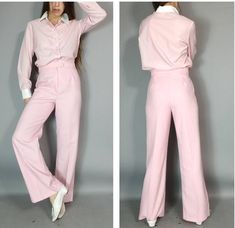 "Super Vintage 70s 80s Blouse and High Waisted Pant Suit Outfit in fun pink  Pink button down top with white collar and cuffs - woven pink wide leg high waisted pant with zip/button closure - great together for a total look or mixed with the wardrobe label Donnkenny top tag size 13/14 100% polyester pant tag size 9/10 85% Dacron poly 15% nylon size/fit top estimated fit s-l pant estimated fit s-m approximate measurements - taken with garment laid flat armpit 21\" across hem 21.5\" length 24.75\" Vintage Pink Wide Leg Bottoms, Vintage Pink Wide-leg Bottoms, Fitted Pink Button-up Bottoms, Retro Full-length Pink Pants, Pink Retro Pants, Vintage Pink Wide Leg Pants, Vintage Pink Cotton Pants, Pink Wide Leg Retro Pants, Fitted 1970s Style Spring Pants