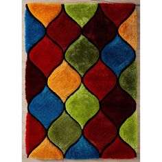 a multicolored area rug with an abstract design on the front and back side