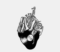 a black and white drawing of a musical instrument in the shape of a human heart