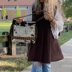 Looking for a unique and stylish shoulder bag that exudes western flair? Look no further than our Western Leather Cowhide Shoulder Fringe Tote Bag! Handcrafted from premium leather and genuine cowhide, this purse features beautiful fringe detailing and a spacious interior perfect for carrying all your daily essentials.  Whether you're heading to work or out on the town, this handmade purse is sure to turn heads and make a statement. So why wait? Order your very own Western Leather Cowhide Should Western Leather Bags For Fall, Western-themed Brown Leather Shoulder Bag, Western Brown Bags For Fall, Western Style Brown Bag For Fall, Brown Leather Bags For Rodeo, Western Style Rectangular Shoulder Bag For Travel, Brown Rectangular Bag For Rodeo, Rectangular Brown Bag For Rodeo, Western Style Brown Bags For Daily Use