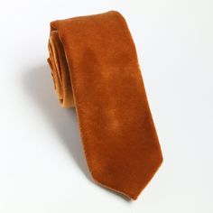 "Burnt Orange Wedding Velvet Tie, Burnt Orange Men's Ties, Burnt Orange Bow Tie, Pocket Square Burn Orange, Burnt Orange Dress Tie, E1279 Burnt orange wedding tie is one of our most favorite groomsmen ties chosen to outfit wedding party. The fine fabric on this necktie gives off the great shine and looks great at any formal or informal gatherings. Even though this burnt orange men's tie is so popular for weddings, it is still an ideal choice for business attire. Great design and texture tie gives you more confidence and attracts more attention.  This burnt orange bow tie is ideal for those that are looking for a trendy tie that adds color to the shirt without being too flashy or overpowering. Perfect for weddings, business meetings, casual throw, and proms! This classy tie is a great finis Elegant Orange Suit And Tie Accessories For Formal Occasions, Classic Brown Ties For Wedding, Classic Brown Wedding Ties, Classic Brown Ties For Party, Burnt Orange Bow Tie, Orange Bow Tie, Wedding Velvet, Burn Orange, Burnt Orange Wedding