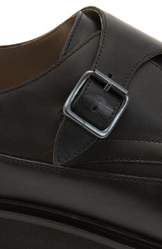 Neat stitching enhances the clean lines of a smooth leather monk-strap shoe grounded by a durable rubber sole. Leather upper and lining/rubber sole Made in Portugal Business Leather Slip-on Shoes With Tang Buckle, Black Monk Strap Shoes With Leather Lining, Black Monk Strap Shoes With Brogue Detailing For Business, Classic Black Monk Strap Shoes With Leather Sole, Classic Black Monk Strap Shoes With Brogue Detailing, Black Monk Strap Shoes With Leather Sole, Black Leather Monk Strap Slip-on Shoes, Black Monk Strap Shoes With Stitched Sole, Leather Monk Strap Shoes With Leather Footbed, Slip-on