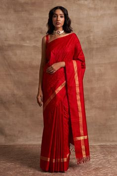 Red Banarasi handloom saree with woven geometric pattern border, self-checkered design and fringe border.
Components:1

Fabric:Base Fabric Pure Silk
Color:Red
Kadhua crafted
Note: Blouse worn by the model is not for sale - Aza Fashions Red Chanderi Pre-draped Saree With Zari Weaving, Red Tussar Silk Pre-draped Saree For Festivals, Red Cotton Silk Pre-draped Saree For Puja, Traditional Chanderi Blouse Piece With Tilla, Red Raw Silk Pre-draped Saree For Diwali, Festive Slub Silk Pre-draped Saree For Puja, Festive Chanderi Blouse Piece With Tilla Details, Red Semi-stitched Slub Silk Pre-draped Saree, Festive Cotton Silk Traditional Wear For Rituals