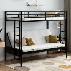 a bunk bed with a futon underneath it in a room next to a window