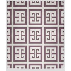 a purple and white area rug with an interlocked design