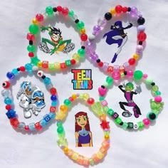 the teen titans bracelets are decorated with various character beads and bead designs on them