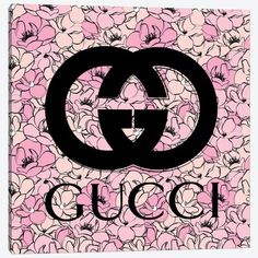 a pink and black floral print with the word gucci on it