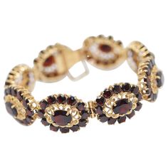 Magnificent Ladies Garnet Bracelet, 14K Gold. Bracelet is hallmarked. Including certificate of authenticity. Luxury Garnet Gemstone Bracelets, Luxury Garnet Bracelets For Gift, Retro Bracelet, Ladies Bracelet, Garnet And Gold, Garnet Bracelet, Garnet Jewelry, Certificate Of Authenticity, Vintage Bracelets