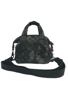 Small quilted handbag Removable adjustable strap Removable strap drop: 23 inches  Lightweight nylon material  Zipper closure  Inside: 1 slip pocket and one zipper pocket Bag measurements:  Length 9 inches  Height 6.75 inches Width 4 inches Camo Quilt, Quilted Handbag, Nylon Handbag, Quilted Handbags, Lightweight Quilt, Mini Quilt, Small Quilts, One Bag, Pocket Bag