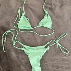 Size M, But Def More For A Small Or Even An Xs Super Cheeky! Never Worn Bought For $75 Turquoise Stretch Swimwear Beachwear, Green Stretch Swimwear For Vacation, Turquoise Stretch Swimwear For Beachwear, Green Stretchable Swimwear For Vacation, Turquoise Triangle Top Swimwear For Summer, Turquoise Summer Swimwear For Vacation, Turquoise Tie-side Bottom Swimwear For Pool, Turquoise Tie-side Swimwear For Pool, Casual Turquoise Swimwear For Spring