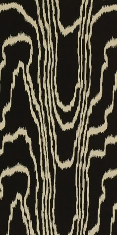 an abstract black and white pattern on fabric