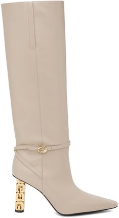 Knee-high buffed calfskin boots in beige. · Pointed toe · Criss-crossing pin-buckle ankle strap · Concealed elasticized gussets at collar · Grained calfskin lining · Logo hardware at block heel · Treaded goatskin sole with rubber injection · Heel: H3.25 in Supplier color: Beige Beige Leather Knee-high Boots With Pointed Toe, Chic Beige Knee-high Workwear Boots, Chic Beige Knee-high Boots For Work, Chic Beige Boots For Workwear, Chic Beige Boots For Work, Chic Beige Workwear Boots, Beige Leather Knee-high Boots With Comfort Fit, Beige Leather Knee-high Boots Medium Width, Beige Calf Leather Boots With Reinforced Heel