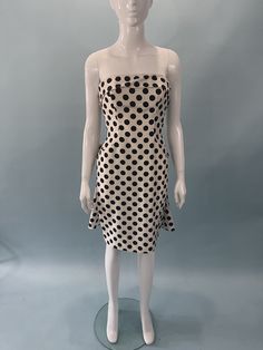 Scassi's women's black & white polka dot sleeveless cocktail dress.  Size: Small (4) Measurements: Bust:30| Hip: 36| Waist: 33  In excellent condition  This item is sold from a vintage boutique in 5006 1/2 York Blvd Los Angeles Ca 90042 Elegant Polka Dot Knee-length Mini Dress, Sleeveless Polka Dot Mini Dress, Polka Dot Sleeveless Mini Dress, Polka Dot Knee-length Party Dress, Chic Strapless Polka Dot Dress, Polka Dot Sleeveless Evening Dress, Polka Dot Sleeveless Lined Dress, Fitted Polka Dot Mini Dress For Evening, Elegant Strapless Polka Dot Dress