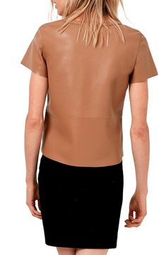 Made from a blend of recycled leather, this T-shirt is a base layer that is far from basic with a very comfortable all-cotton lining. Crewneck Short sleeves Cotton lined 55% recycled leather, 25% polyurethane, 20% polyester Professional leather clean Imported Women's Clothing Leather T Shirt, Layered T Shirt, Recycled Leather, Leather Cleaning, Basic Outfits, Base Layer, Toffee, Comfortable Fashion, V Neck Tops