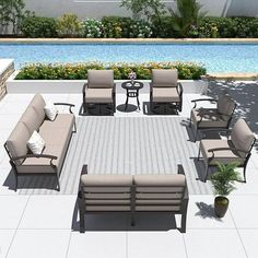 an outdoor seating area next to a swimming pool