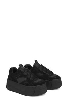 A skater-inspired sneaker set on a bodaciously chunky platform features a mixed-media upper done in varying shades of black for easy pairing. Exclusive retailer 2 3/4" platform Lace-up style Leather upper and lining/synthetic sole Imported Nakedwolfe Sneakers, Naked Wolfe Sneakers, Sneakers With Platform, Black Sneakers Women, Black Platform Sneakers, Ateez Concert, Chunky Platform Sneakers, Concert Ideas, Naked Wolfe