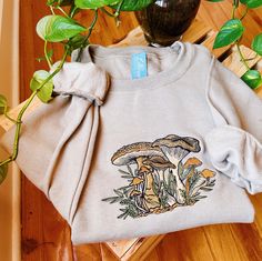 Follow @lebeaudenimco on Instagram to be the first to know about size restocks! Say hello to your new favorite sweatshirt! This cozy crew is designed, digitized, & stitched in our northern Virginia based studio.  * Each crew neck is made to order based on size of your choice. They are already dyed. Please allow up to 14 days to be completed and shipped out. * Please reach out prior to purchase for custom requests. These requests can include size, style, or sweatshirt color. Please note that these requests may cause an increase in price or completion time. I am happy to accommodate need by dates as long as I hear from you prior to purchasing the item. Material: - 50% Cotton, 50% Polyester - All hoodies and crewneck sweatshirts are fleece. Care instructions: - Machine cold wash, inside out, Winter Long Sleeve Tops With Embroidered Patch, Embroidered Long Sleeve Winter Tops, Long Sleeve Tops With Embroidered Patch For Winter, Cotton Sweatshirt With Machine Embroidery For Fall, Custom Embroidery Relaxed Fit T-shirt For Fall, Fall Cotton Sweatshirt With Floral Embroidery, Custom Embroidery Long Sleeve T-shirt For Fall, Long Sleeve T-shirt With Machine Embroidery For Fall, Fall Long Sleeve T-shirt With Machine Embroidery