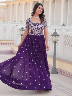 Introducing our captivating purple embroidered georgette function wear gown! This stunning gown is the perfect choice for any special occasion, from festivals to weddings. The gorgeous purple color and sequin embroidery work make this gown a showstopper.
Designed for comfort and style, this gown is fully stitched and available in sizes XS to XXL. The 3.5-meter flair and 56-inch length create a flattering silhouette that will make you feel elegant and confident.
This gown includes intricate sequi Eid Georgette Sequin Gown, Festive Georgette Gown With Sequins, Floor-length Sequin Gown For Eid, Sequin Floor-length Gown For Eid, Sequined Floor-length Gown For Eid, Festive Sequined Georgette Gown, Eid Maxi Gown With Sequins, Purple Sequined Dress For Diwali, Purple Sequin Dress For Eid